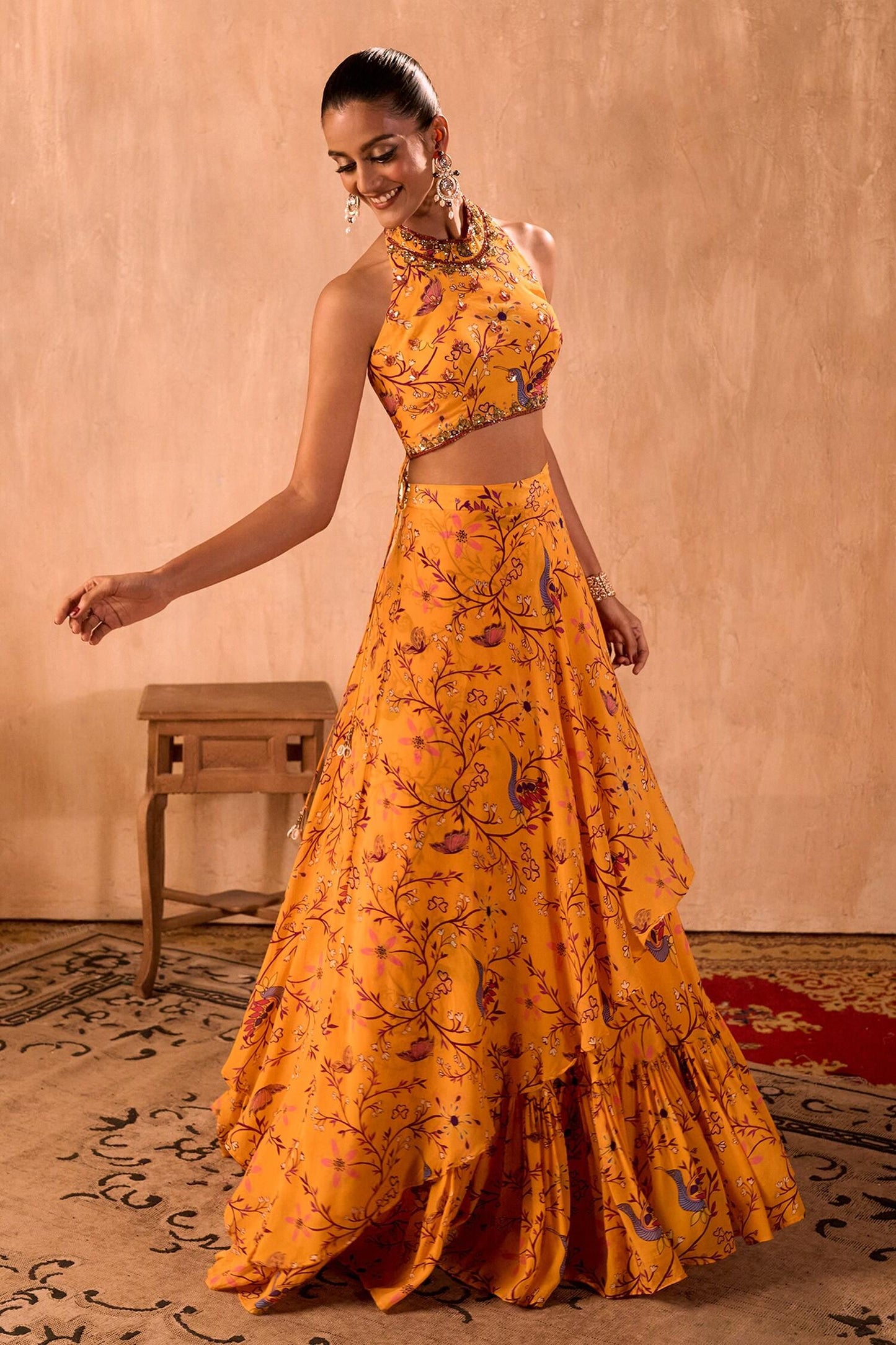 Yellow Crepe Tassels Halter Neck Floral Print Blouse And Layered Lehenga Set - Designer Kurta Set